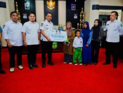 Bupati Luwu Serahkan JKK Rp223,5 Juta ke Ahli Waris, Dorong Percepatan Jaminan Sosial Pekerja